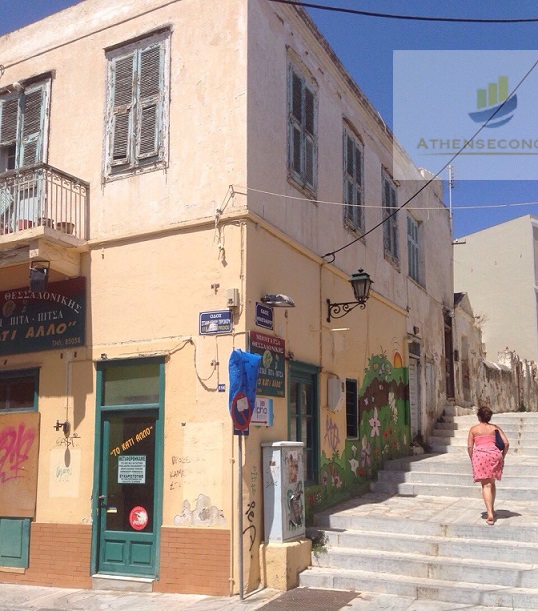 House with shops at Syros island